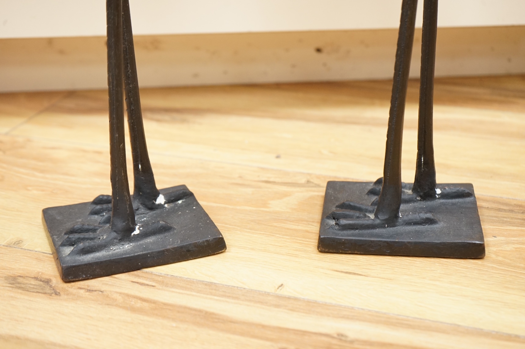 A pair of patinated bronze cranes, 62cm